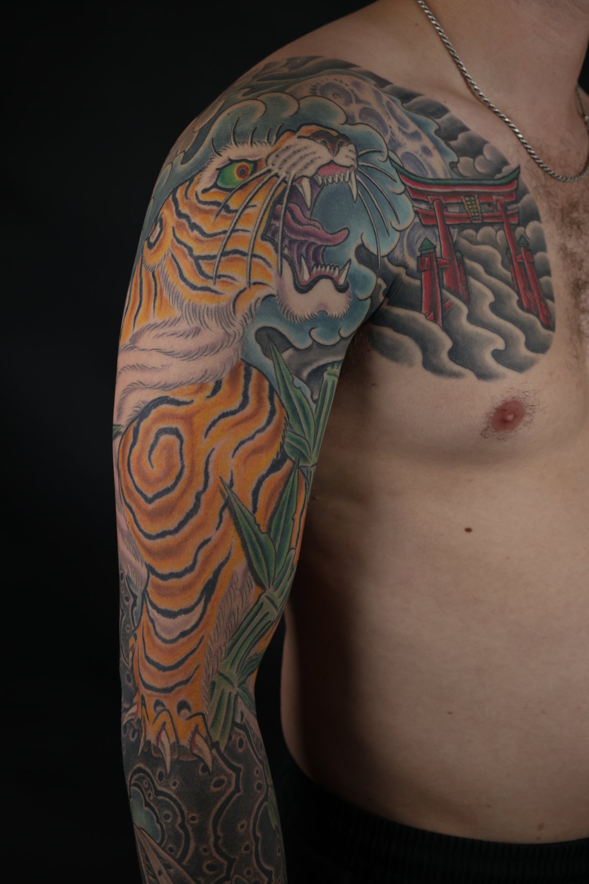 Japanese tattoo detail on shoulder and upper arm