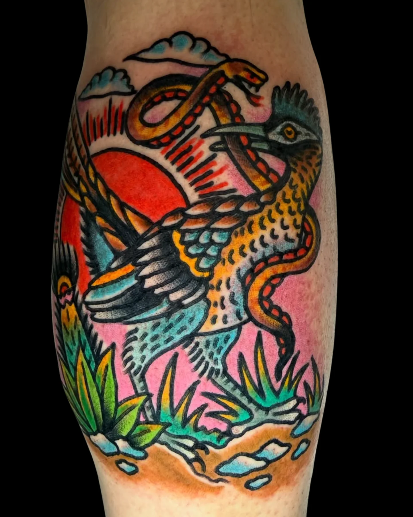 Traditional eagle and snake tattoo by Chris Harris