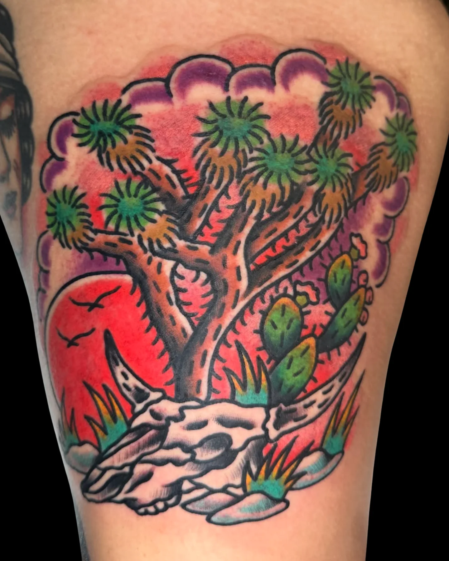 Traditional desert cactus tattoo with an animal skull by Chris Harris