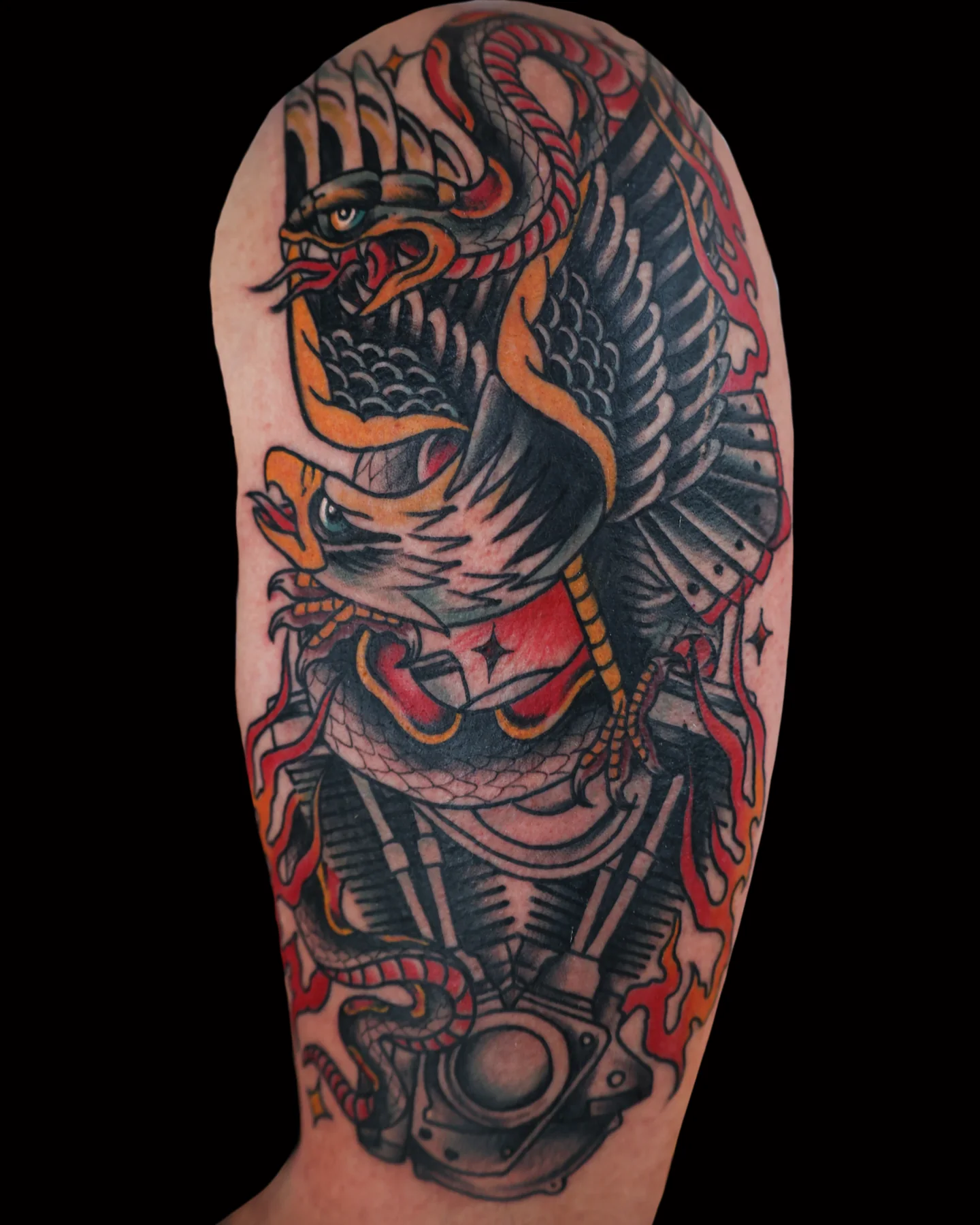 Traditional eagle and engine tattoo by Justin Martinez