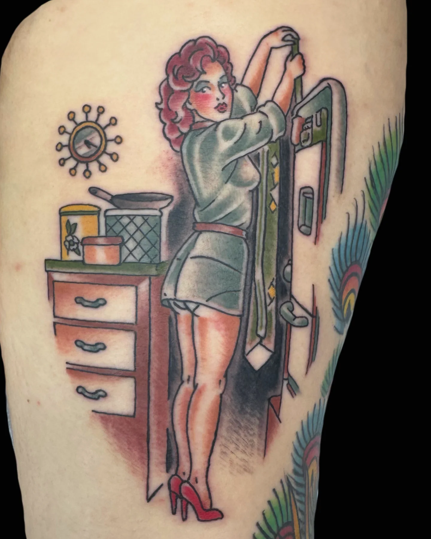 Color pin-up tattoo with tattoo-machine imagery by Nate Haynes