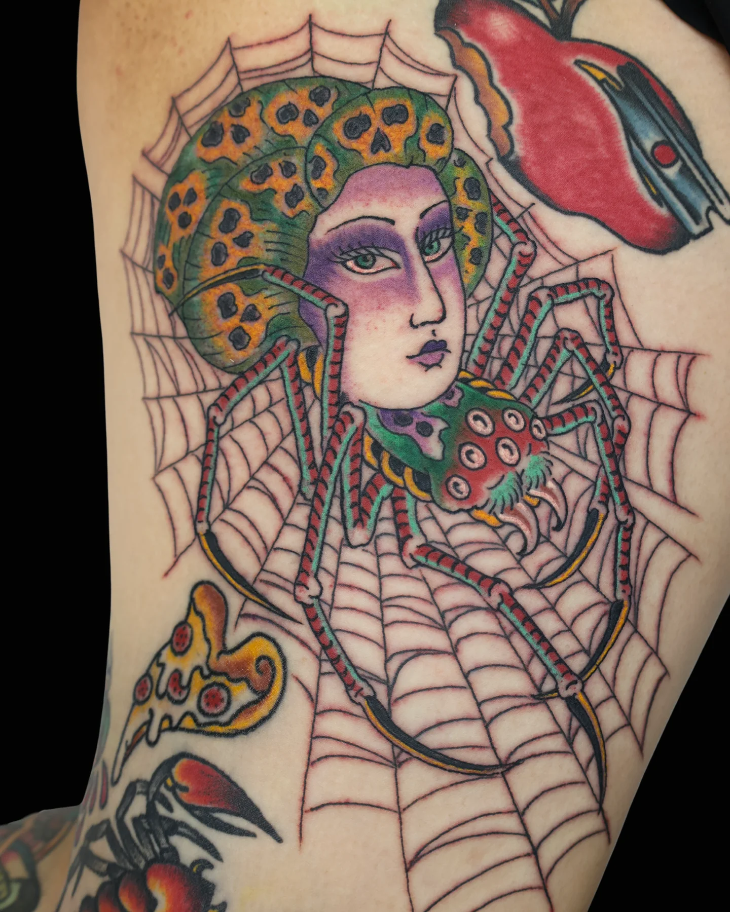 Color portrait tattoo with leopard and spiderweb by Nate Haynes