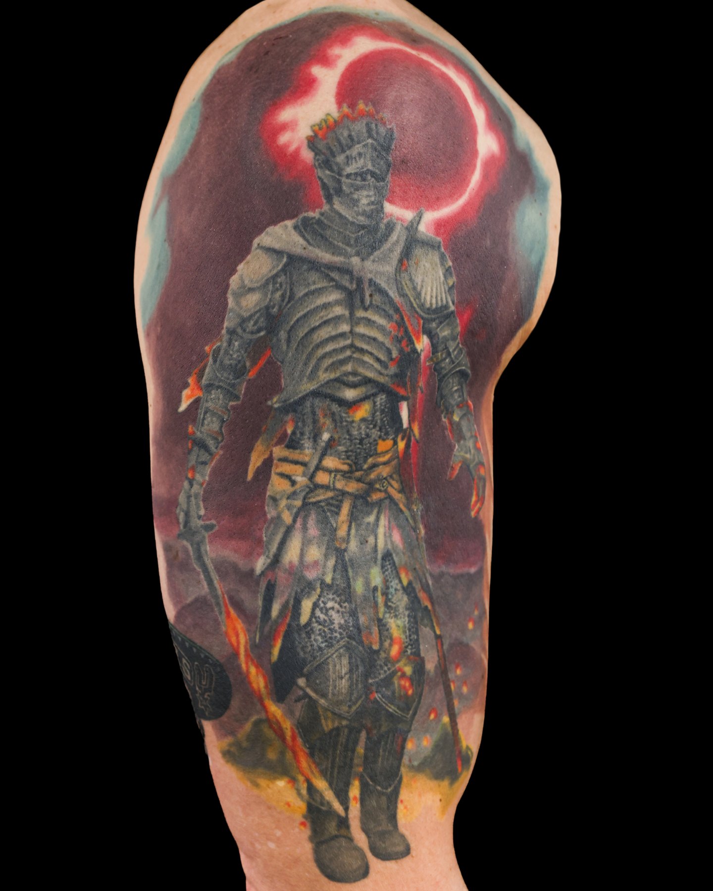 Realistic warrior tattoo against a red eclipse by Brian Pittman