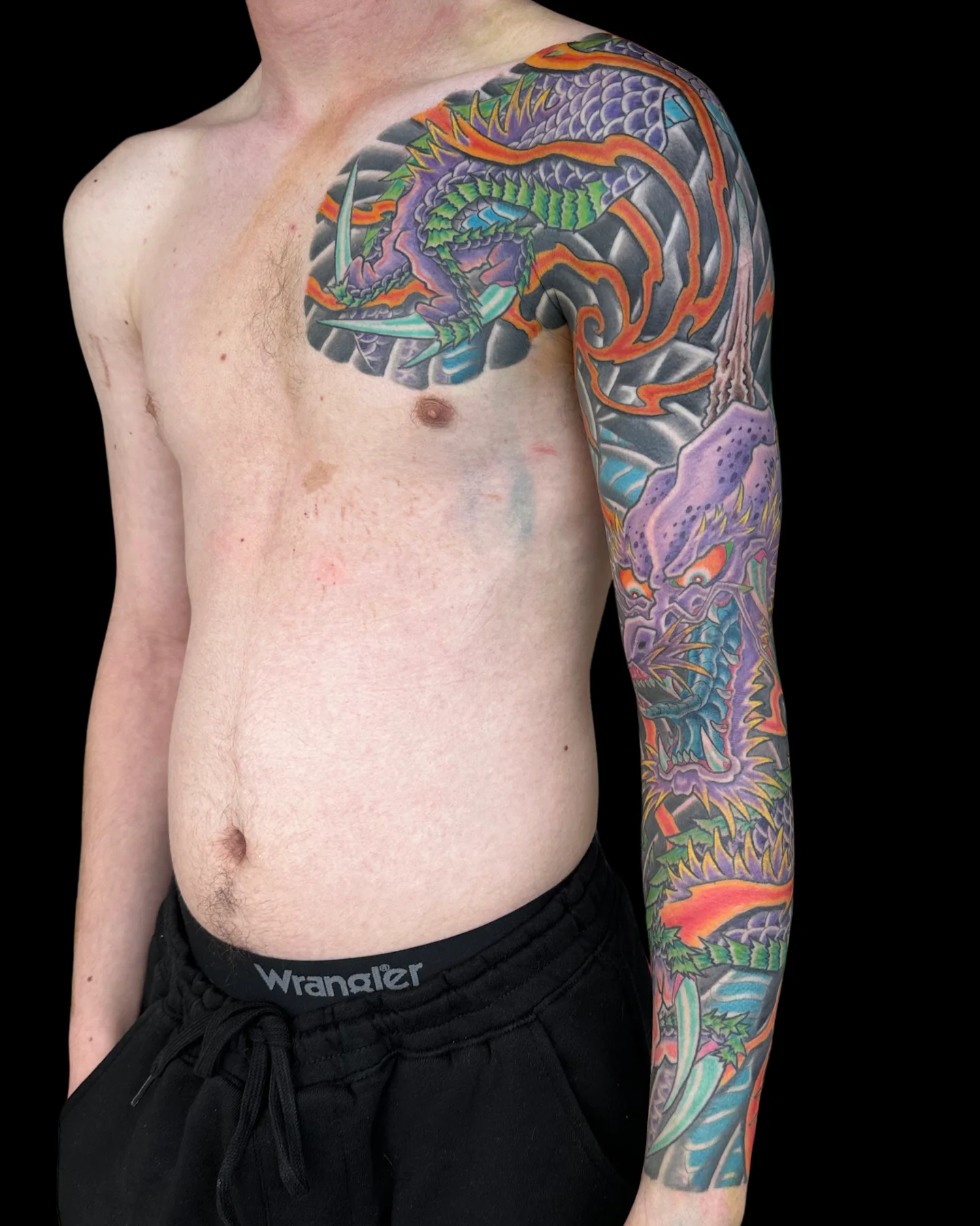 Japanese-style color chest and arm tattoo by Angel Serda