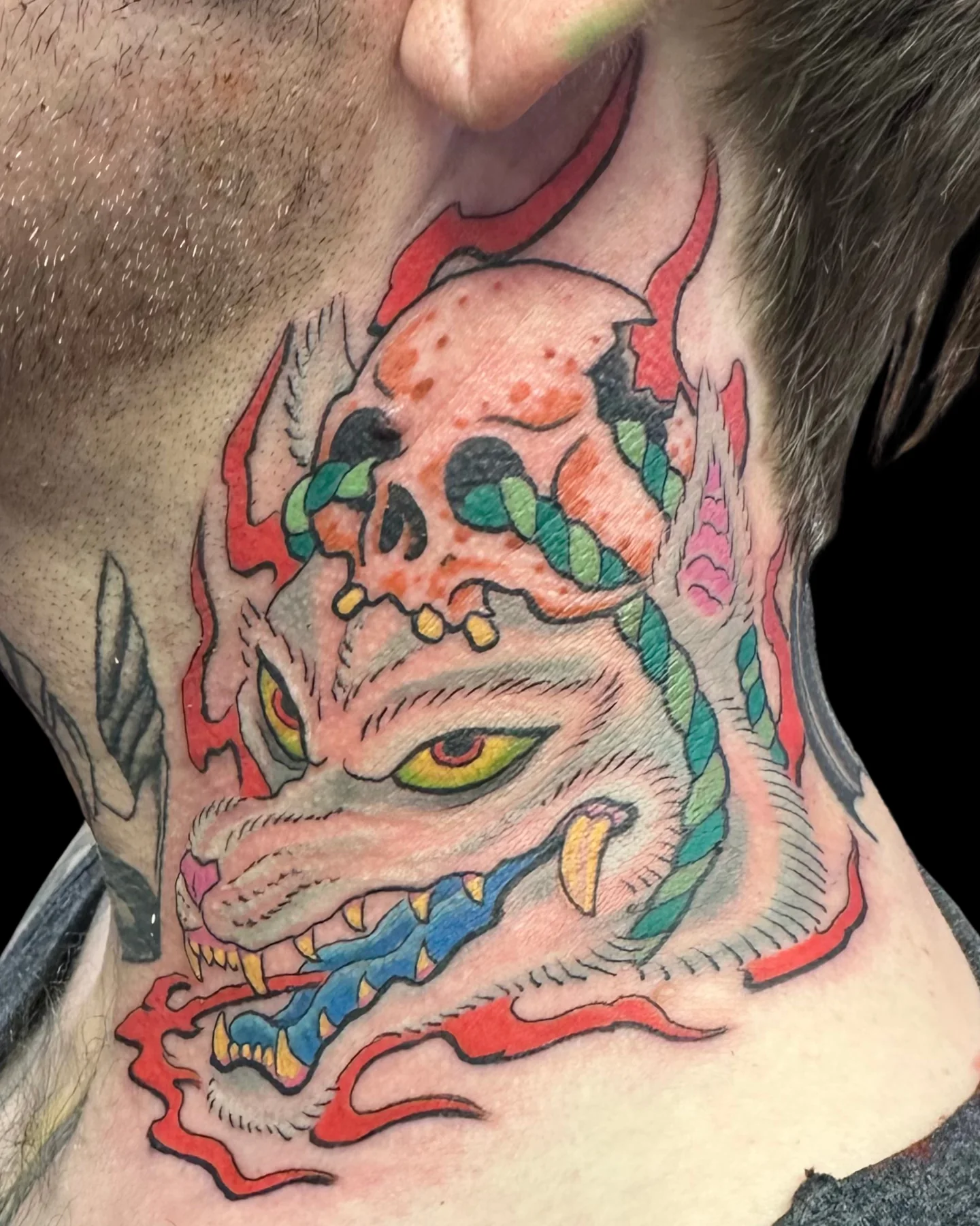 Japanese-style dragon tattoo across the chest by Angel Serda