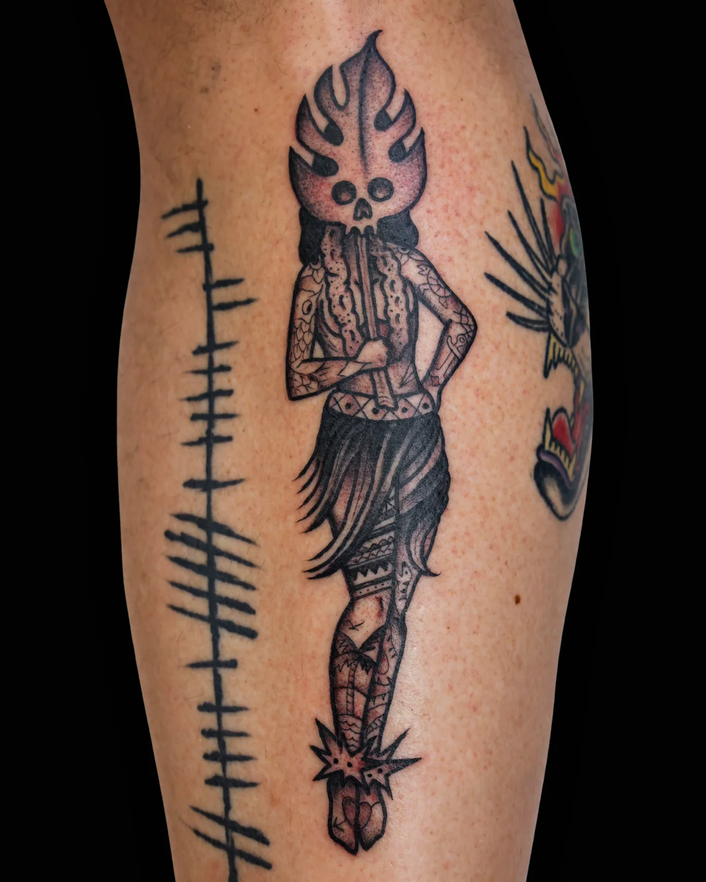 Black and grey flaming dagger tattoo by Justin Martinez