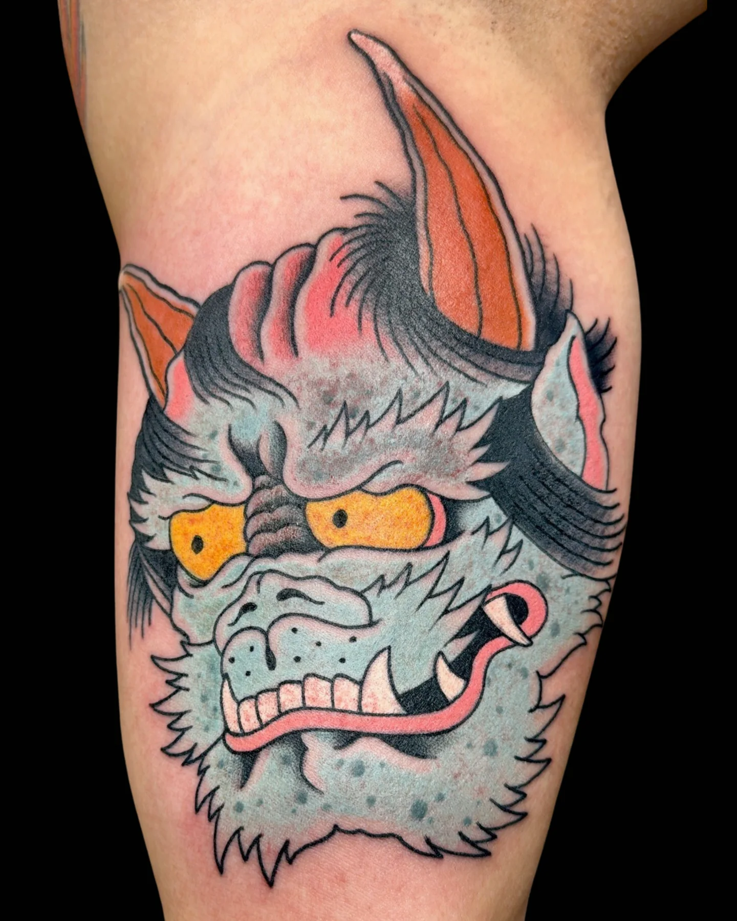 Japanese-inspired horned mask tattoo by Chance Ewing