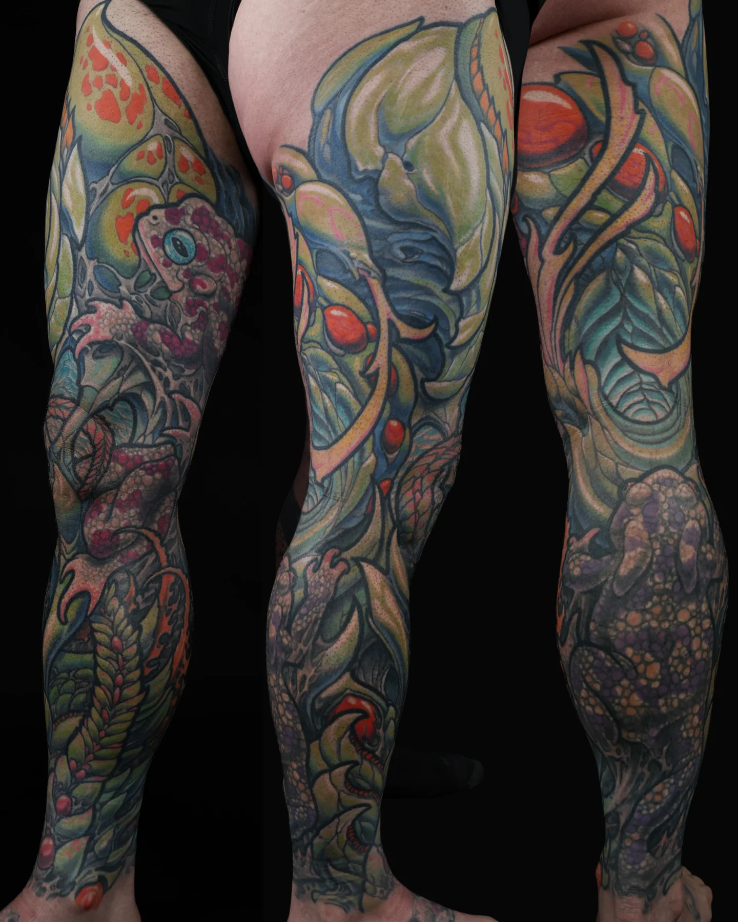 Color biomechanical leg tattoos by Josh Standley