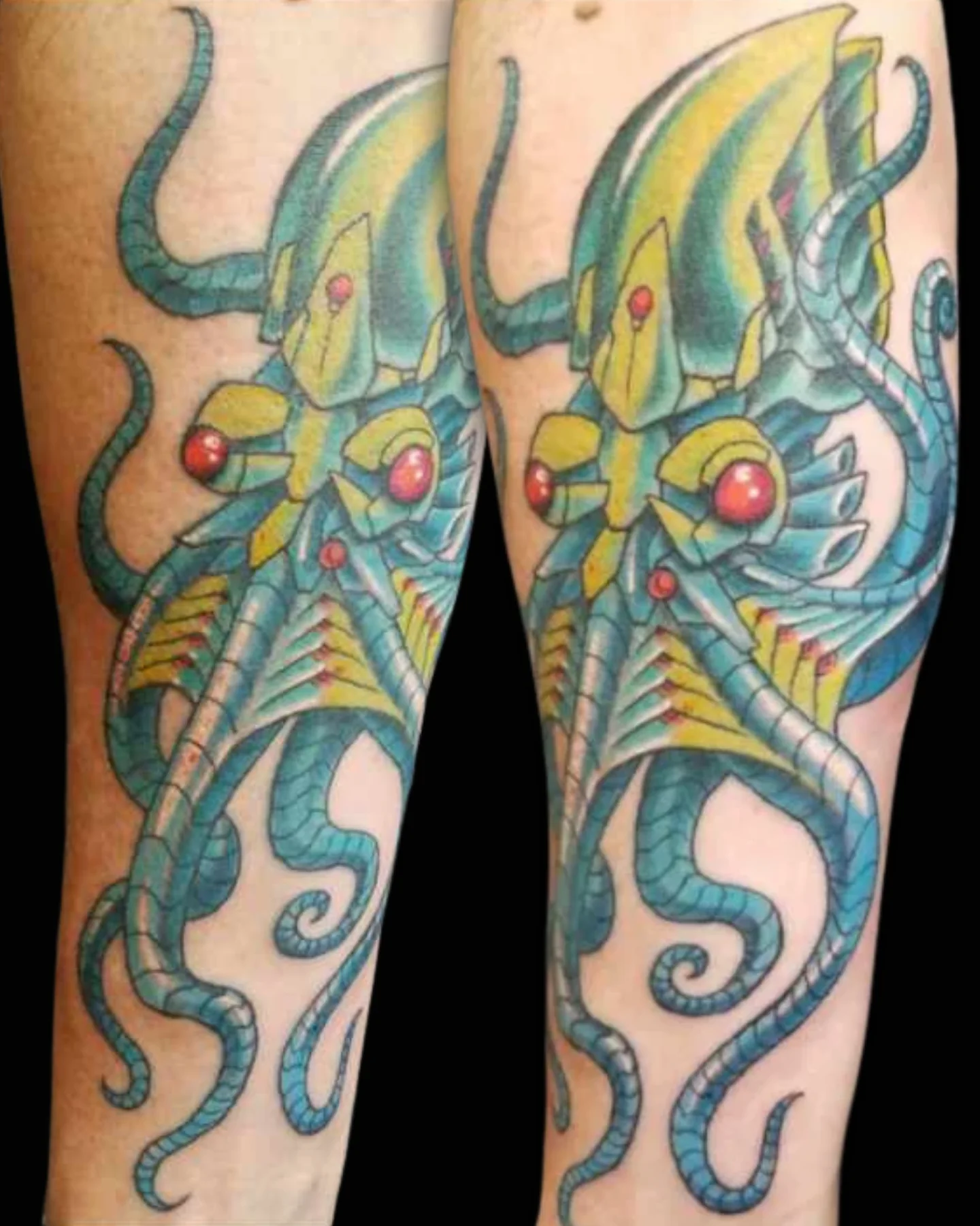 Color biomechanical tattoo shown from two angles by Josh Standley