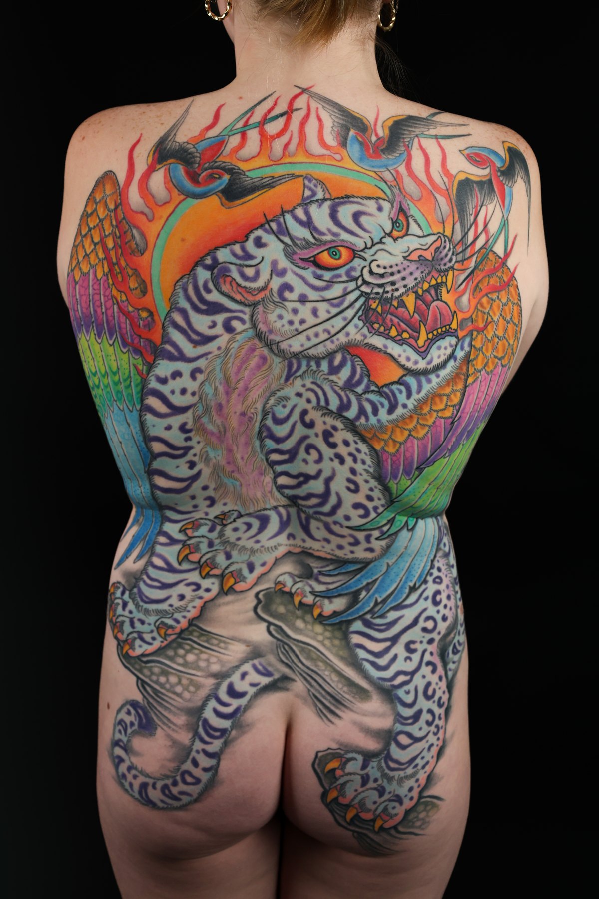 Texas Wild Style full-back tattoo with tiger imagery by Jedidia Reid