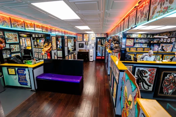 Inside Element Tattoo: colorful tattoo flash, artwork and artist stations
